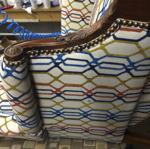Swivel Chair Reupholstery and Brass Nailing         